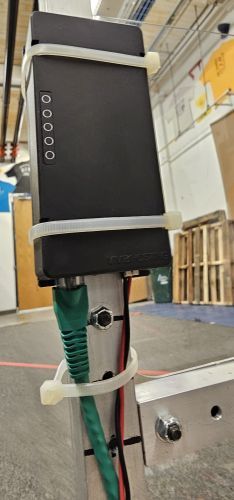 Picture of the KitBot showing radio ethernet cable plugged into VH-109 AUX port.